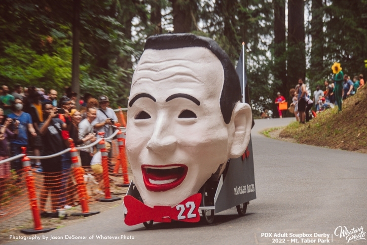 A Peewee Herman-themed soapbox car races in the PDX Adult Soapbox Derby.